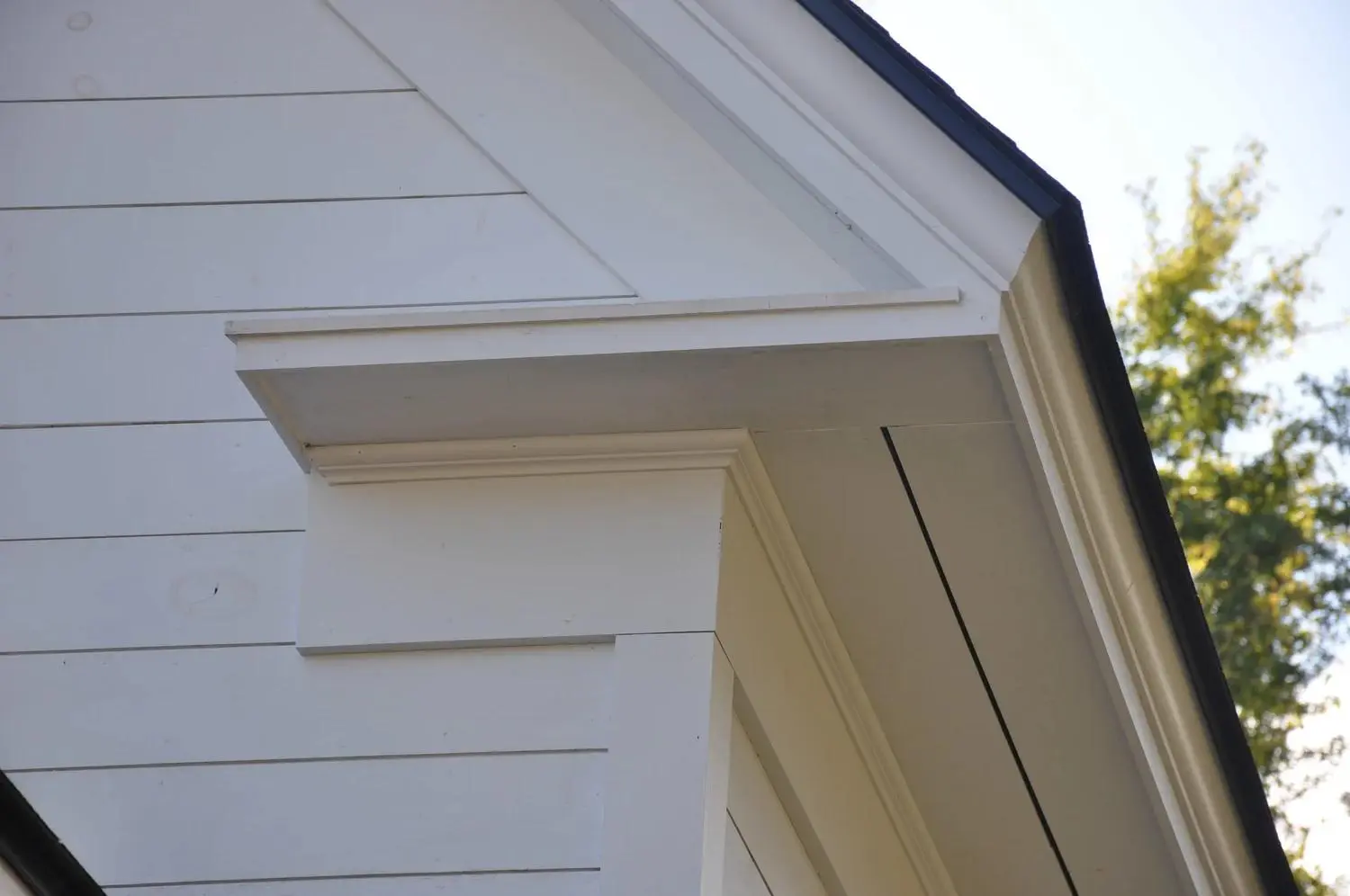 Close-up reference of exterior corner and roof trim